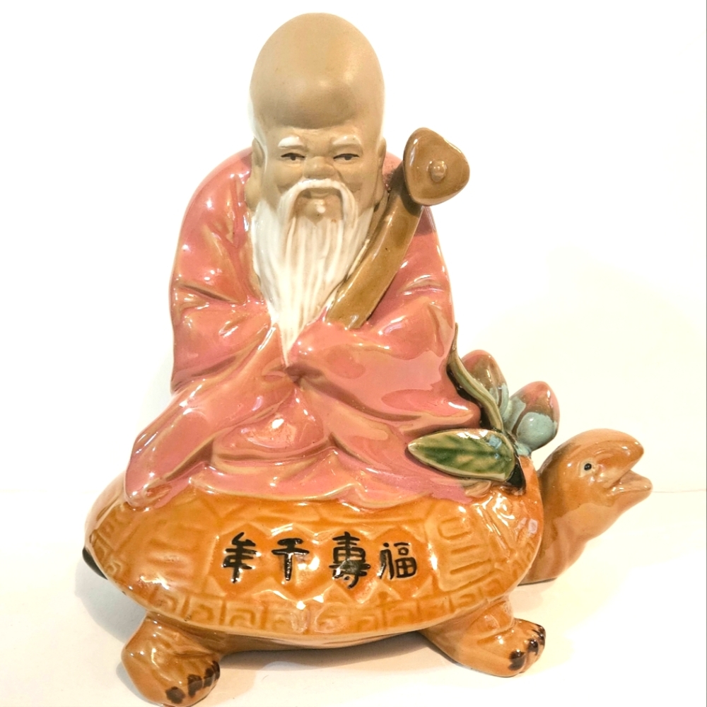 Chinese Mud Man Xing Lao God of Longevity Resting on a Turtle Statue Figurine